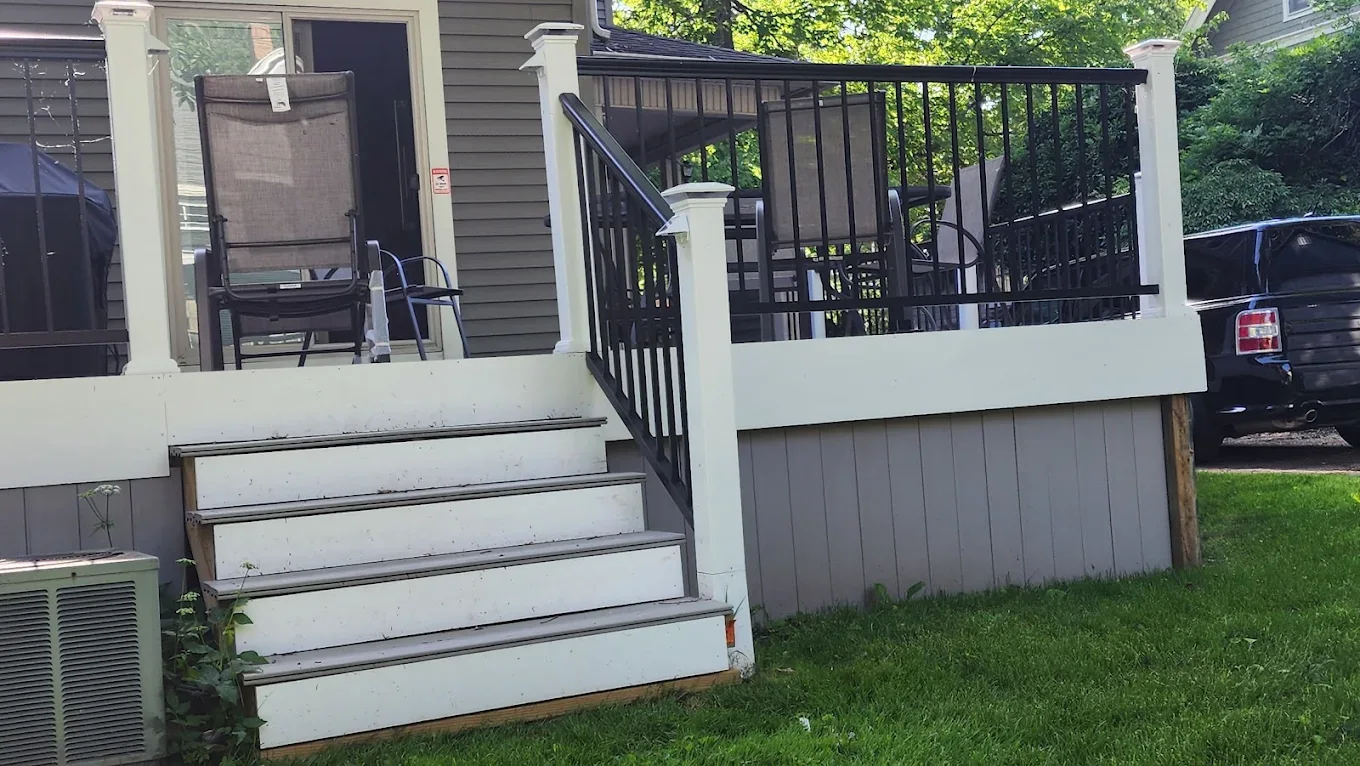 Renovated front porch with steps and railings